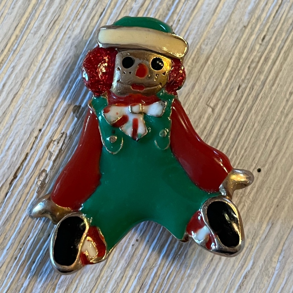 Raggedy Andy vintage pin.